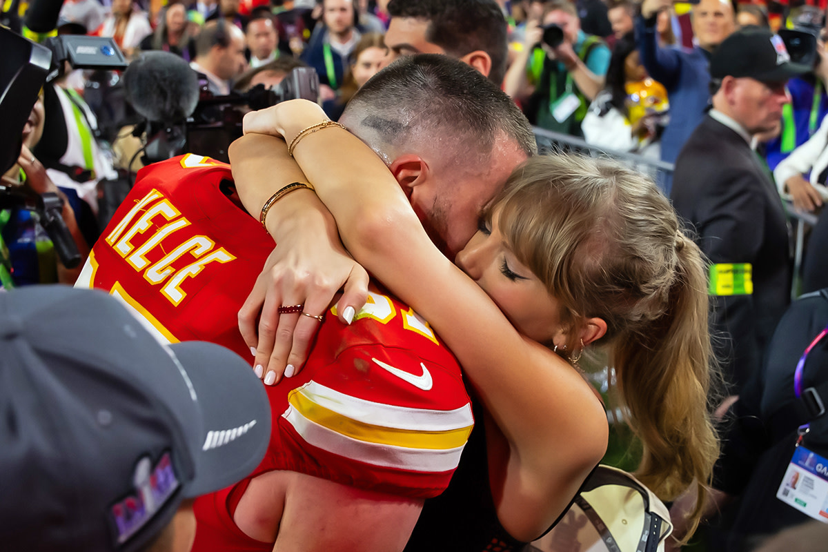 Kansas City Chiefs tight end Travis Kelce celebrates with girlfriend Taylor Swift after the 2024 Super Bowl.