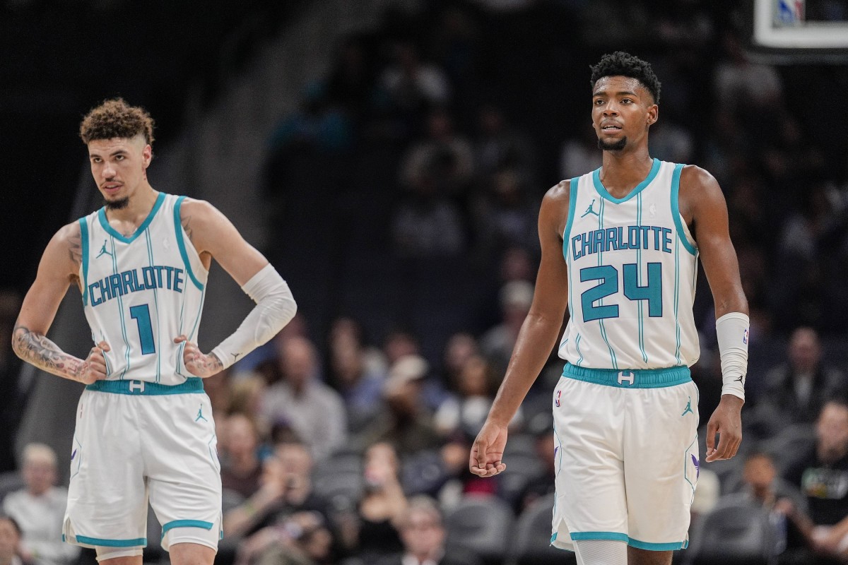 Charlotte Hornets guard LaMelo Ball (1) and forward Brandon Miller (24) 