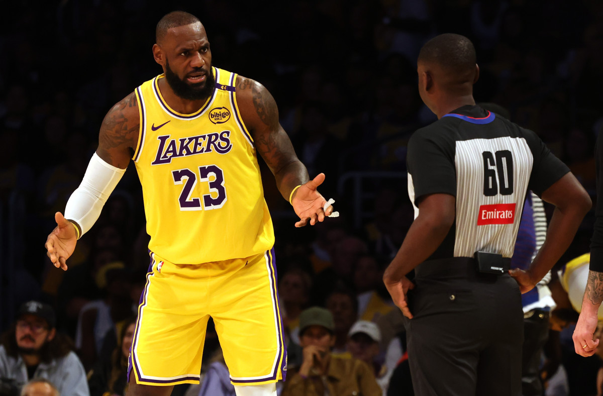 LeBron James of the Los Angeles Lakers and NBA referee James Williams