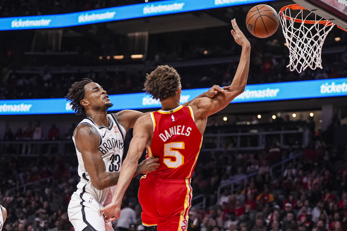 Brooklyn Nets center Nic Claxton (left).