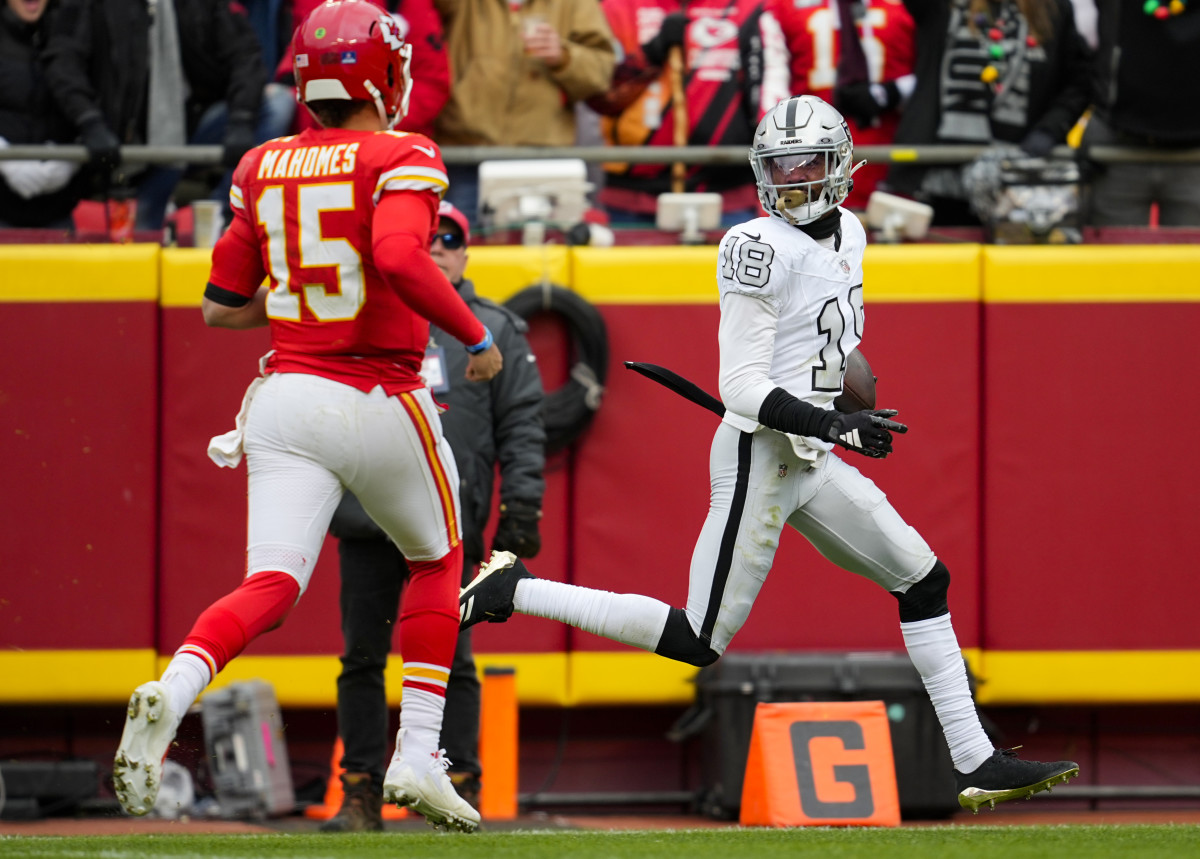 Las Vegas Raiders cornerback Jack Jones (18) returns an interception against Chiefs quarterback Patrick Mahomes (15).