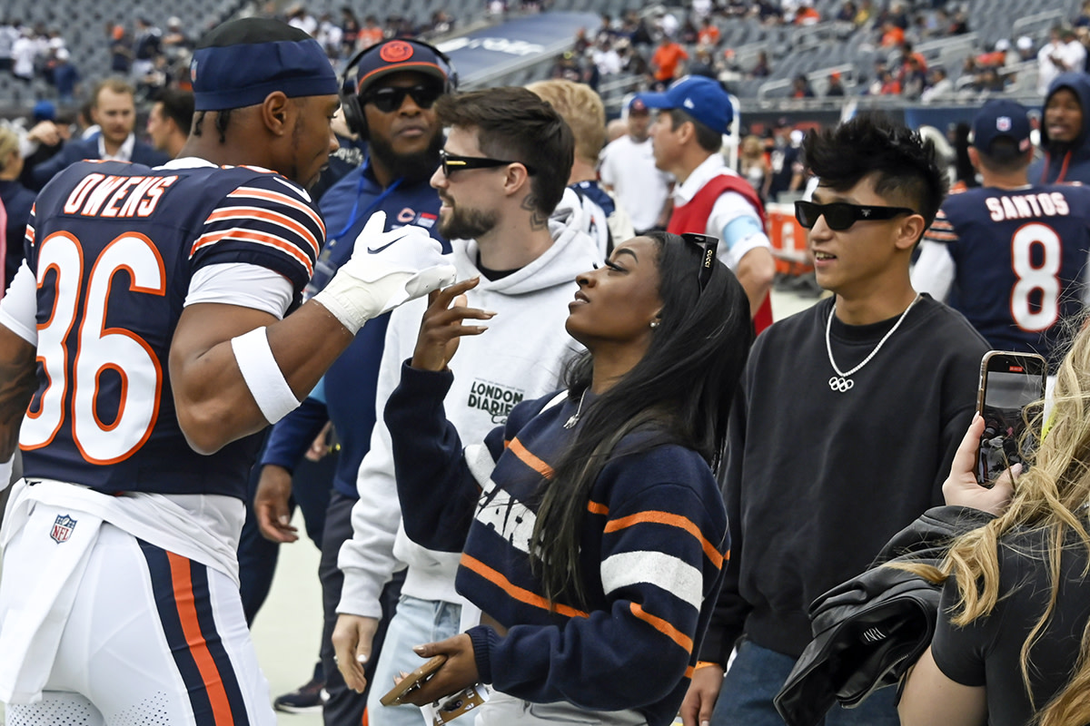 Chicago Bears safety Jonathan Owens (left) and wife Simone Biles