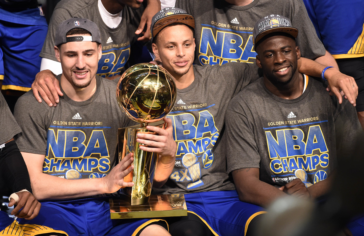 Golden State Warriors guard Klay Thompson (11), guard Stephen Curry (30), and Draymond Green (23)..