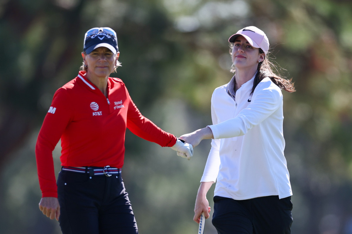 Nov 13, 2024; Belleair, Florida, USA; Annika Sorenstam and Indiana Fever guard Caitlin Clark (22) celebrate after a shot during The Annika golf tournament Pro Am at Pelican Golf Club.