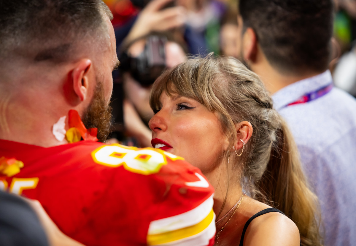 Feb 11, 2024; Paradise, Nevada, USA; Kansas City Chiefs tight end Travis Kelce (87) celebrates with girlfriend Taylor Swift after defeating the San Francisco 49ers in Super Bowl LVIII at Allegiant Stadium. Mandatory Credit: Mark J. Rebilas-Imagn Images