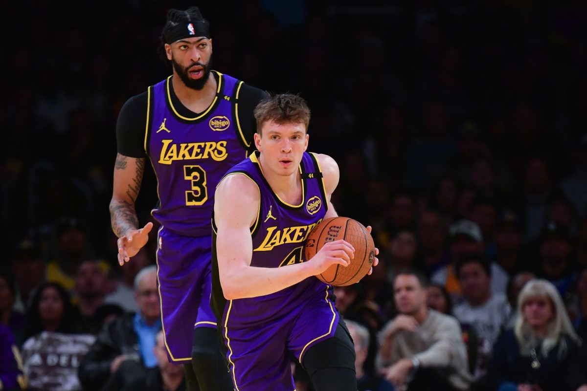 Los Angeles Lakers guard Dalton Knecht pushes the ball upcourt.