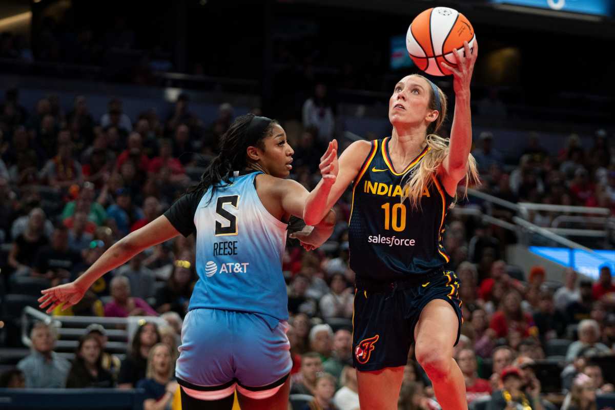 Indiana Fever guard Lexi Hull (10) and Chicago Sky forward Angel Reese (5)