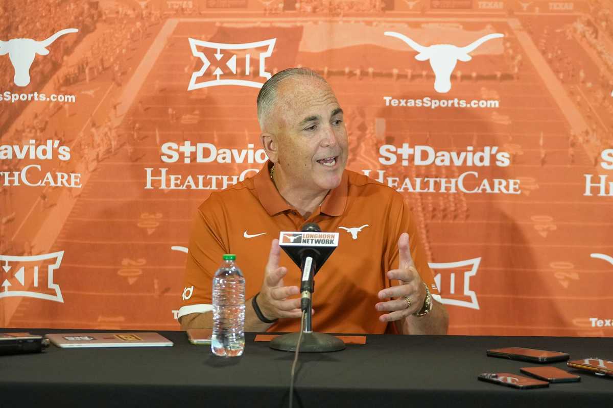 Longhorns Offensive coordinator Kyle Flood answer questions from the local news media during the first press conferences for the 2023 football season on August 1, 2023.