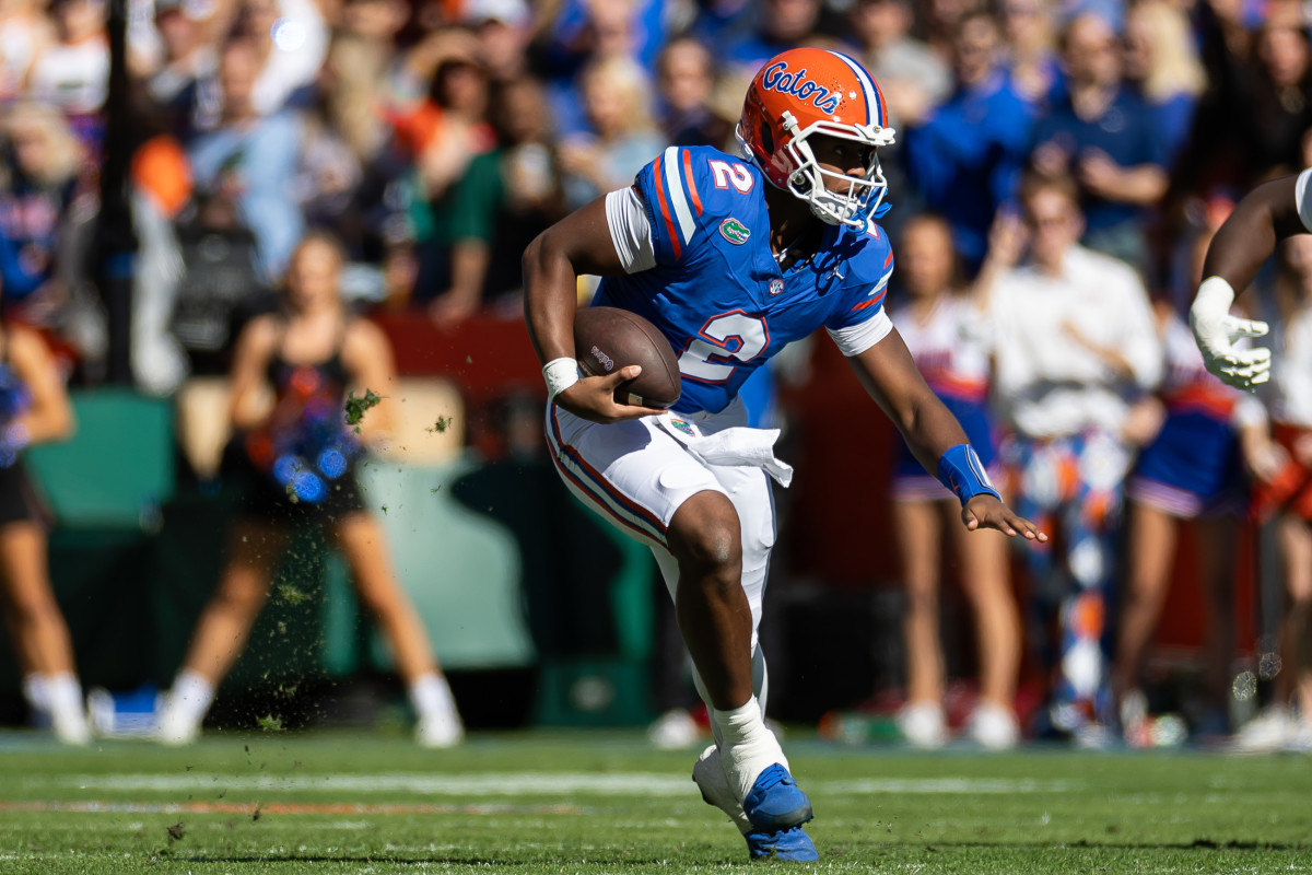 Florida Gators quarterback DJ Lagway (2) runs with the ball.