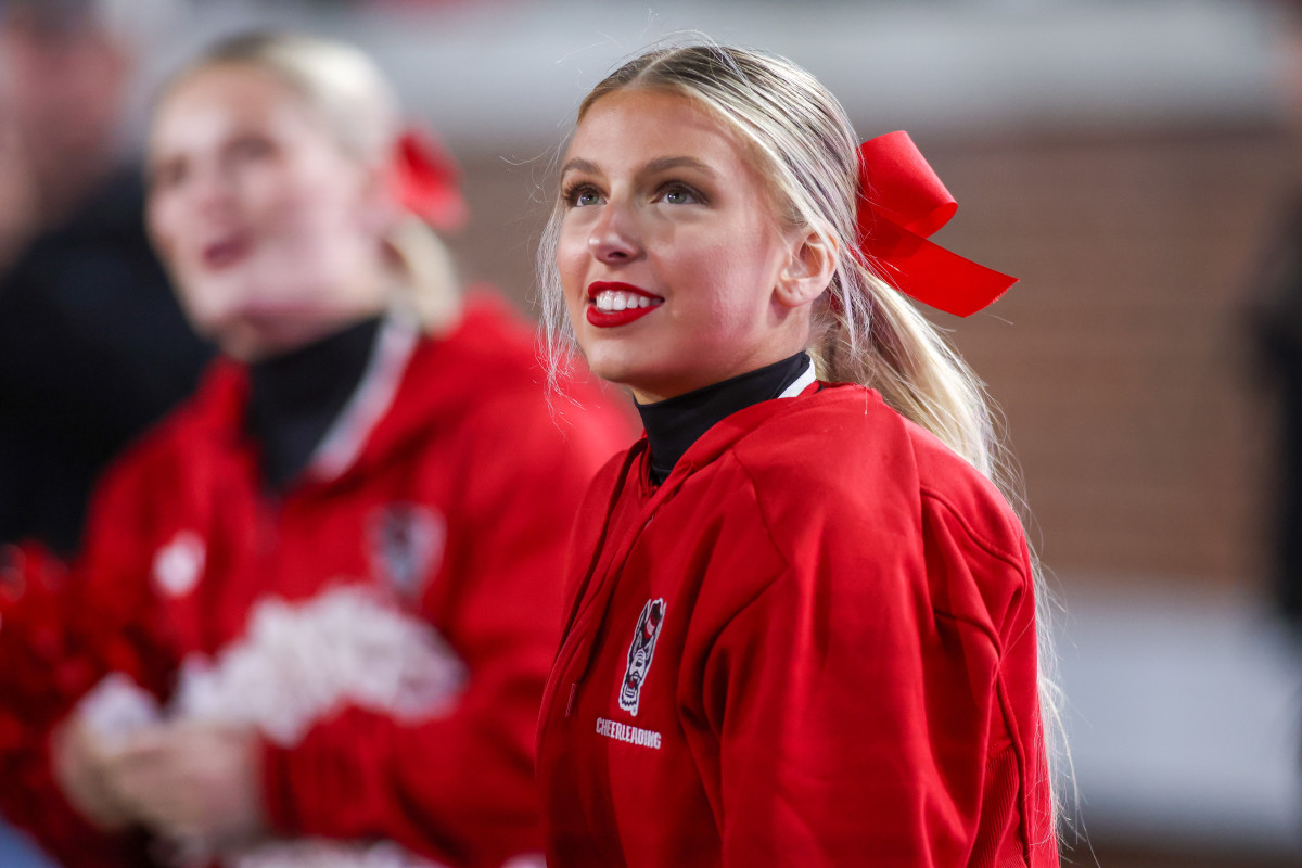 cheerleaders College Football Cheerleaders Catch Attention for Behavior After Postgame  Brawl - Athlon Sports
