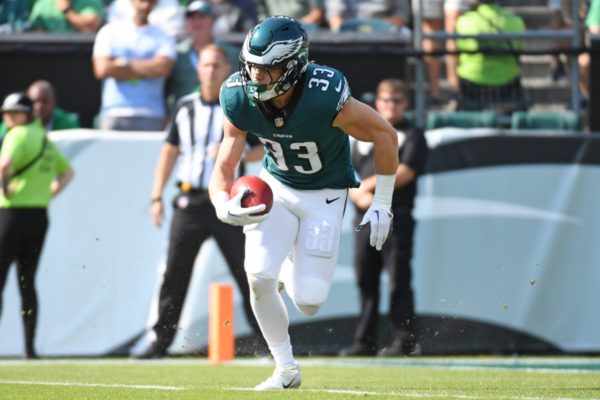 Philadelphia Eagles cornerback Cooper DeJean (33) returns a punt.