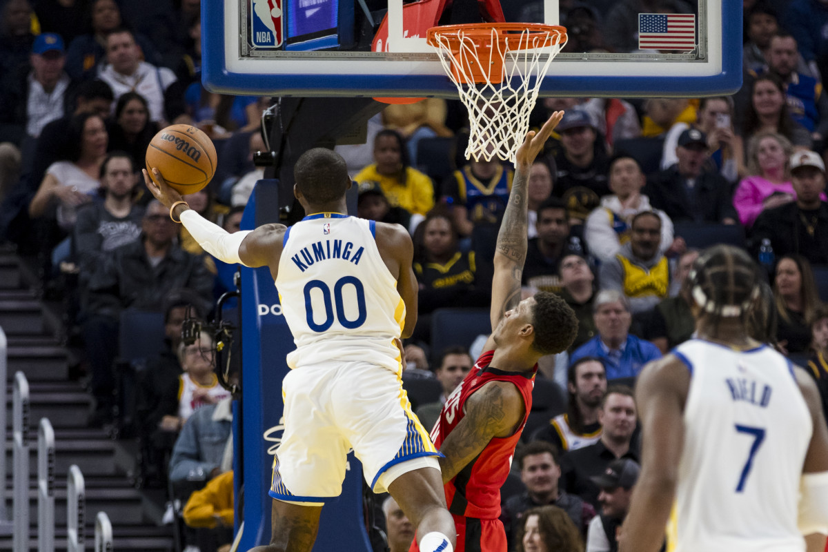 Dec 5, 2024; San Francisco, California, USA; Golden State Warriors forward Jonathan Kuminga (00) shoots against the Houston Rockets during the third quarter at Chase Center. Mandatory Credit: John Hefti-Imagn Images