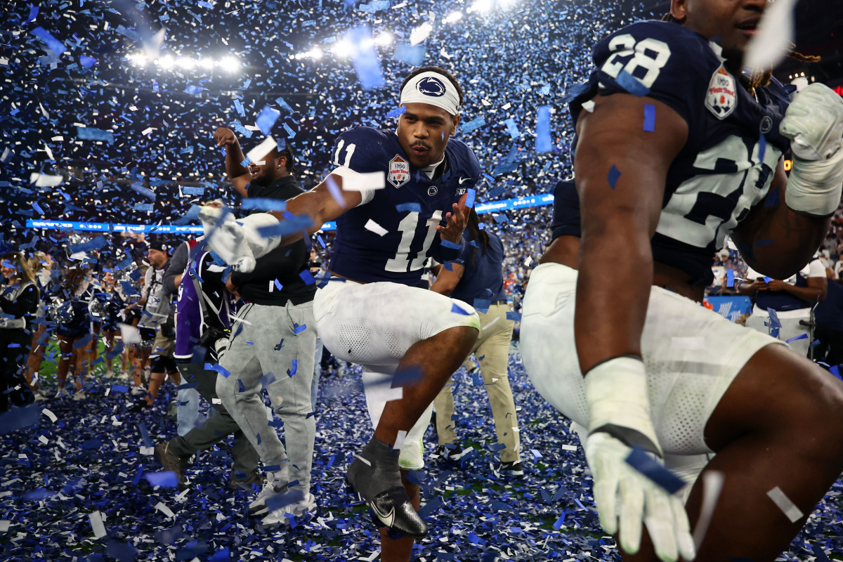 Abdul Carter celebrates with teammates at the Fiesta Bowl vs. Boise State.