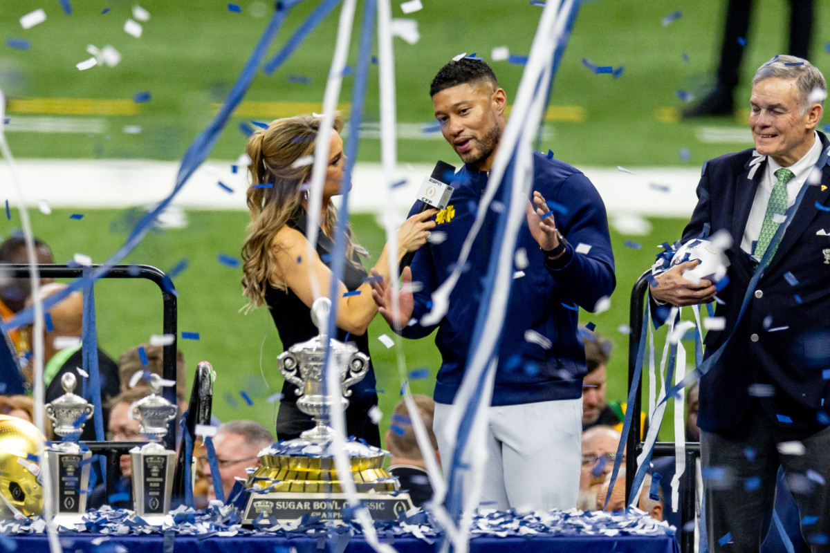 Notre Dame Fighting Irish head coach Marcus Freeman is announced to fans after defeating the Georgia Bulldogs after the game at Caesars Superdome.