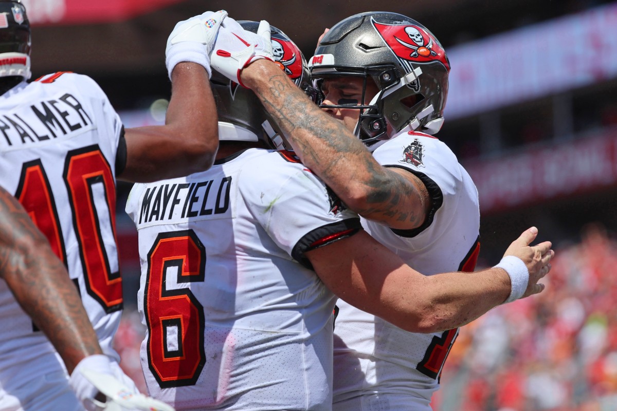 Tampa Bay Buccaneers wide receiver Mike Evans (13) is congratulated by quarterback Baker Mayfield (6) after scoring a touchdown against the Chicago Bears.