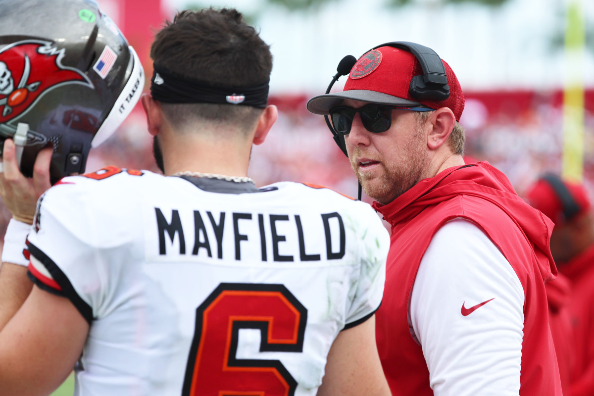 Tampa Bay Buccaneers quarterback Baker Mayfield (6) talks with offensive coordinator Liam Coen.