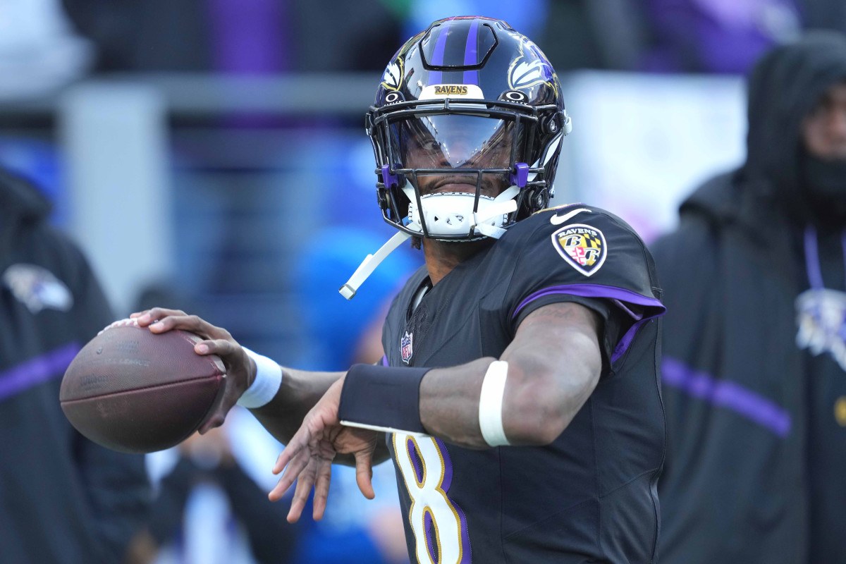 Dec 1, 2024; Baltimore, Maryland, USA; Baltimore Ravens quarterback Lamar Jackson (8) warms up prior the game against the Philadelphia Eagles at M&T Bank Stadium. Mandatory Credit: Mitch Stringer-Imagn Images  