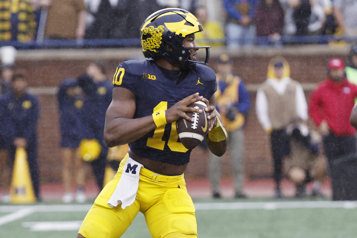 Michigan Wolverines quarterback Alex Orji (10).