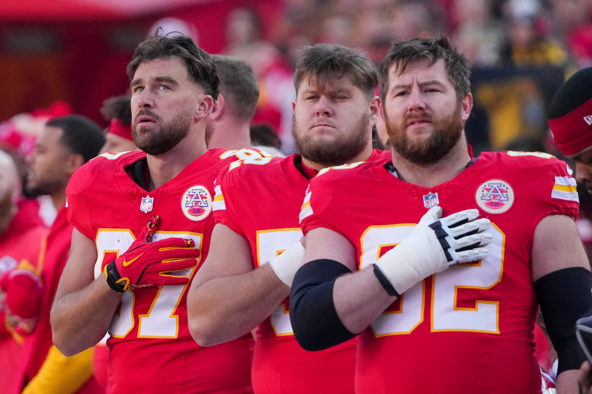 Kansas City Chiefs tight end Travis Kelce (87), center Creed Humphrey (52) and guard Joe Thuney (62).