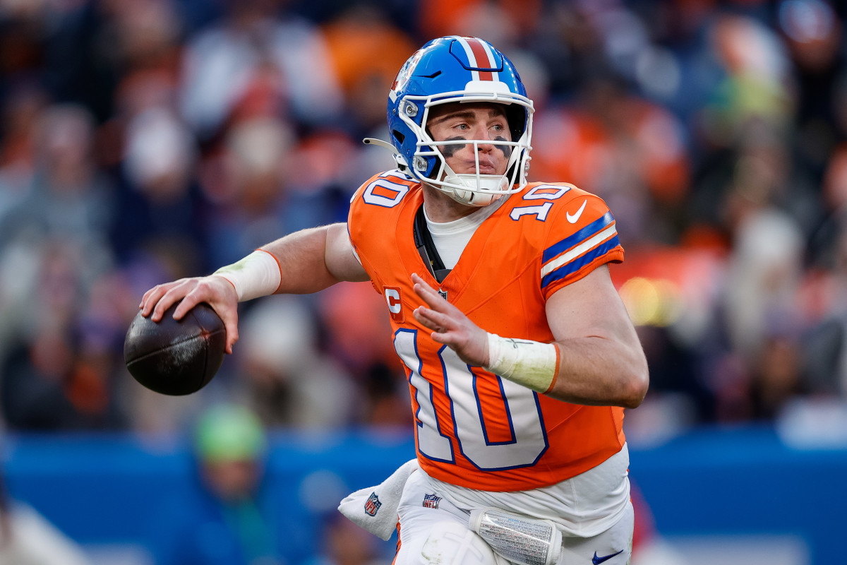 Denver Broncos quarterback Bo Nix (10) looks to pass in the third quarter against the Kansas City Chiefs at Empower Field at Mile High.