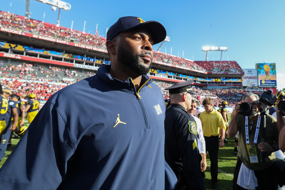 Sherrone Moore celebrates after beating Alabama in Tampa on Dec. 31.