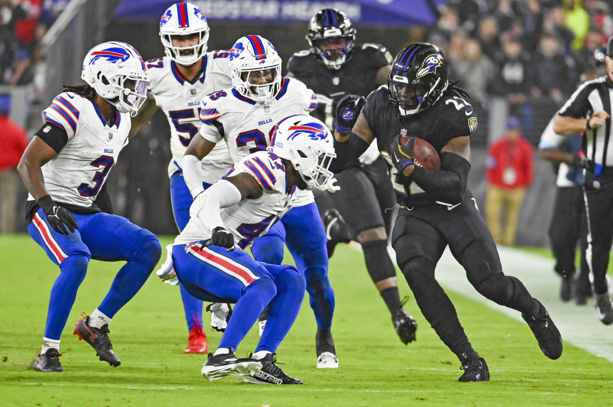 Baltimore Ravens running back Derrick Henry (22) rushes along the sideline against the Buffalo Bills in Week 4.