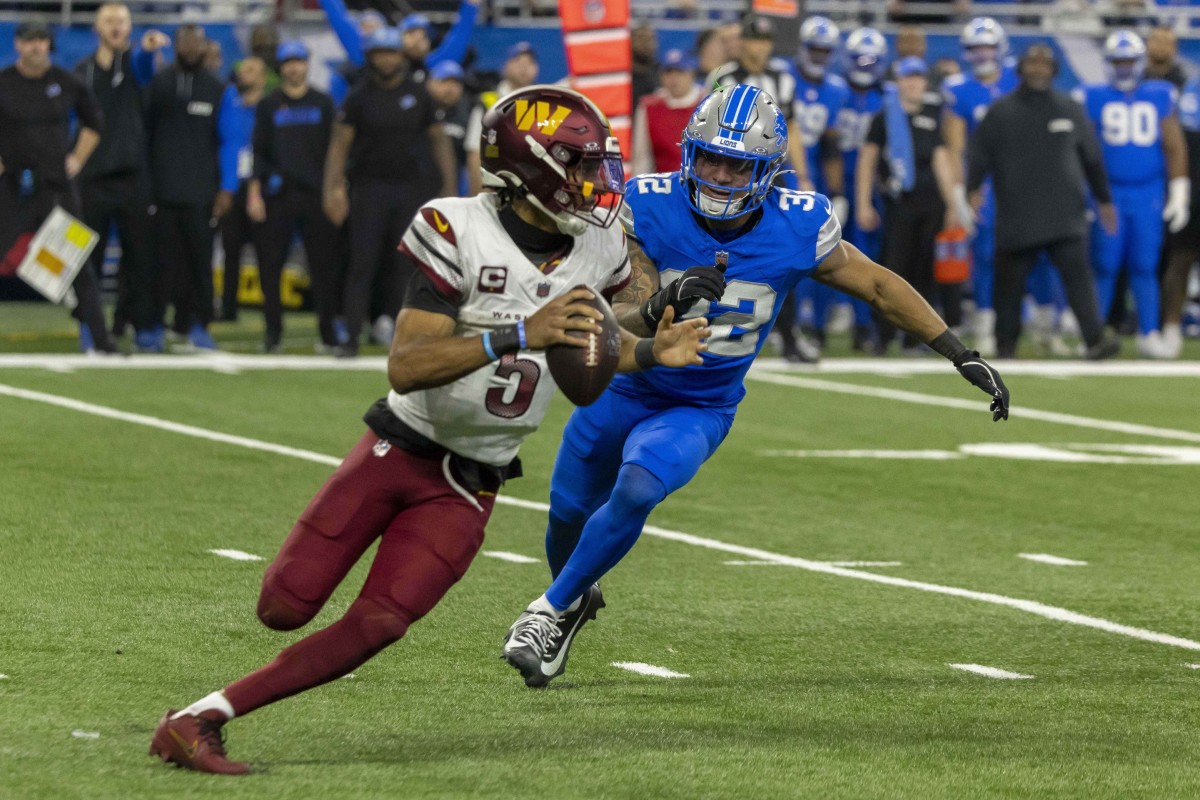 Jayden Daniels looks to pass against Brian Branch in the 2025 NFL Divisional Round