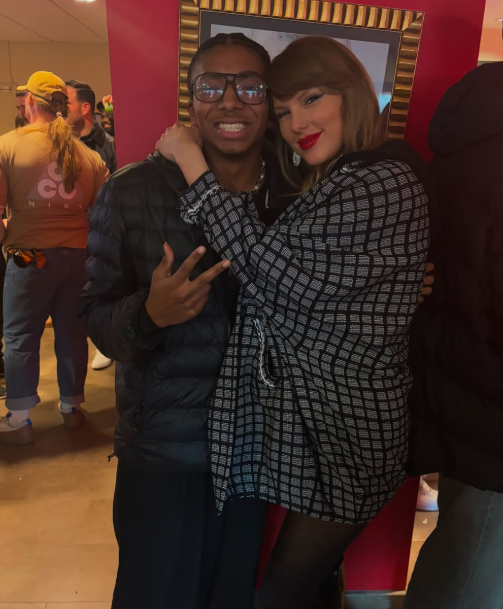 Taylor Swift with one of Travis Kelce's friends at Arrowhead Stadium on Jan. 18, 2025.