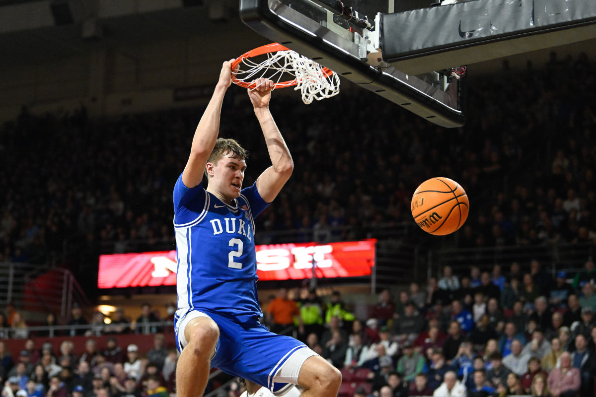 Duke Blue Devils guard Cooper Flagg (2) dunks the ball against the Boston College Eagles during the first half at Conte Forum