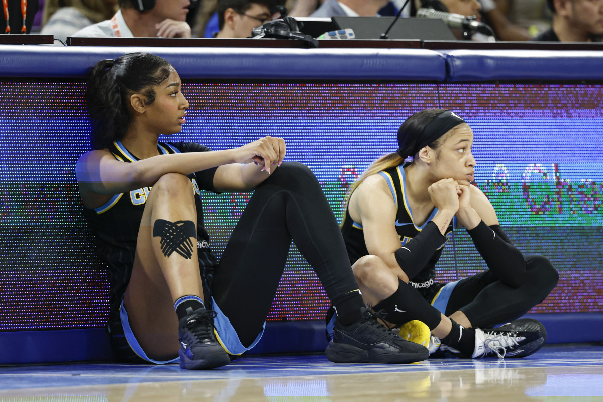 Chicago Sky forward Angel Reese (5) and guard Chennedy Carter (7) wait to enter the game against the Las Vegas Aces.