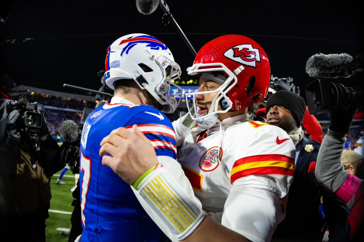 Kansas City Chiefs quarterback Patrick Mahomes (15) greets Buffalo Bills quarterback Josh Allen (17).