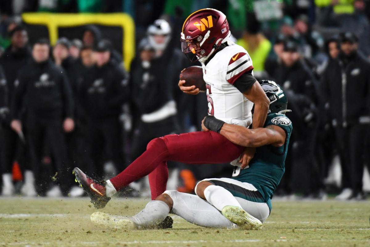 Philadelphia Eagles linebacker Nolan Smith Jr. (3) sacks Washington Commanders quarterback Jayden Daniels (5).