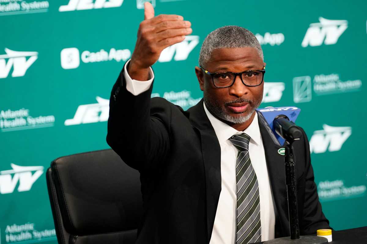 Aaron Glenn gestures at his Jets introductory press conference.