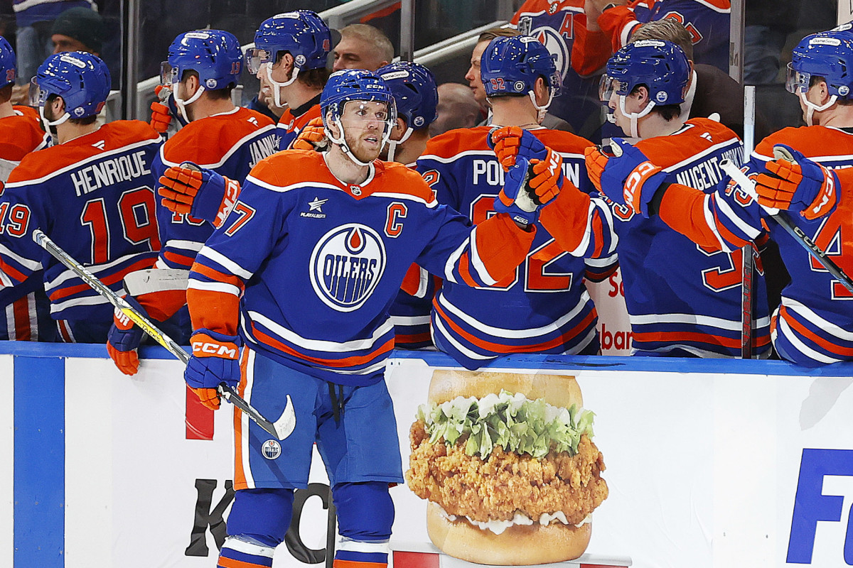 The Edmonton Oilers celebrate a goal scored by forward Connor McDavid (97).