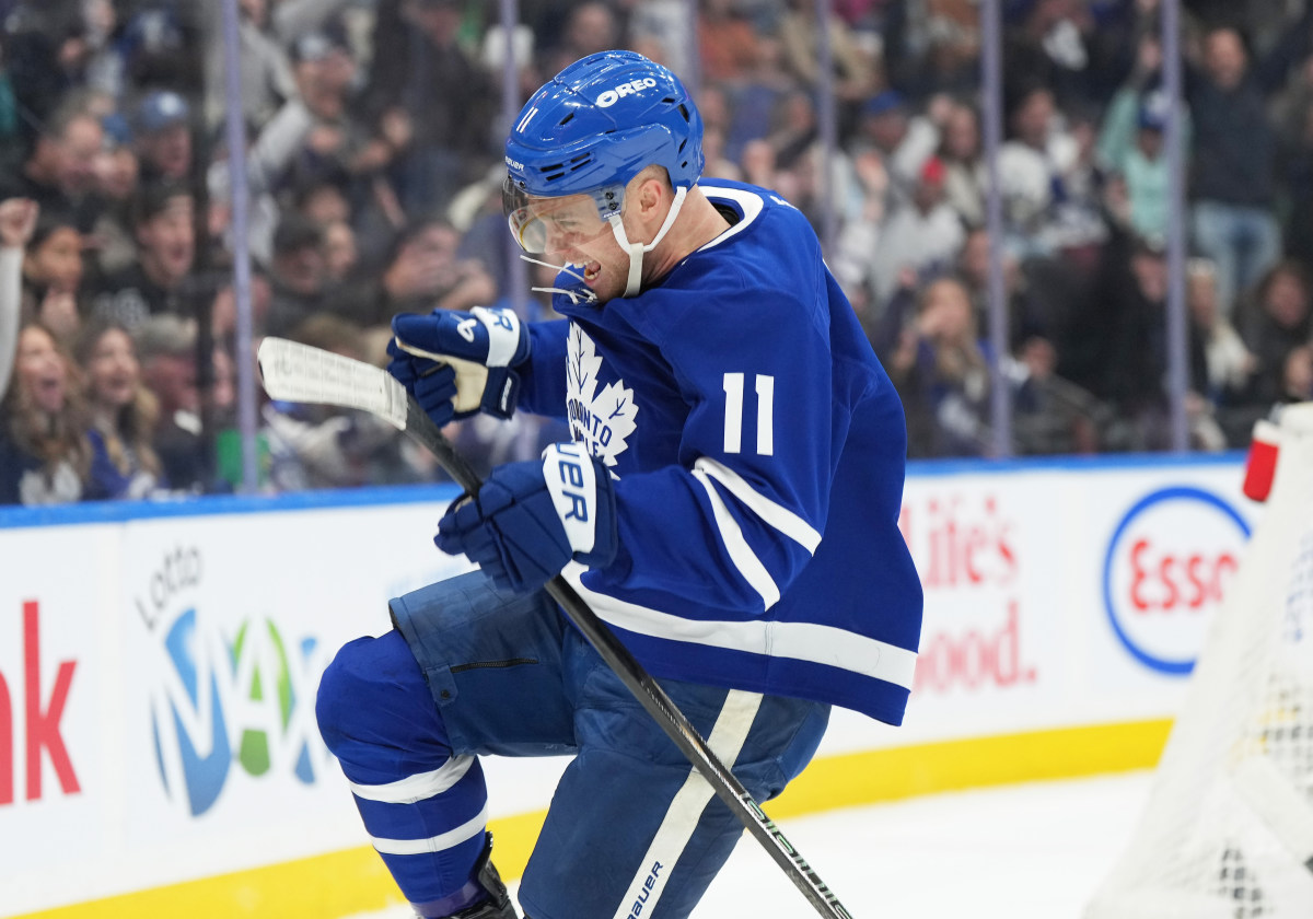 Toronto Maple Leafs center Max Domi (11) celebrates after scoring a goal.