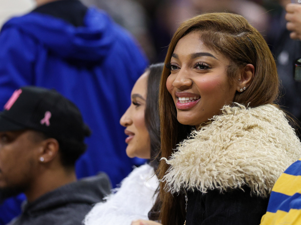 Chicago Sky forward Angel Reese attends an NBA game.