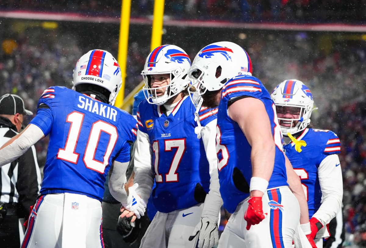 Buffalo Bills QB Josh Allencelebrates with WR Khalil Shakir (10) after scoring a touchdown in a 2025 AFC divisional-round game.