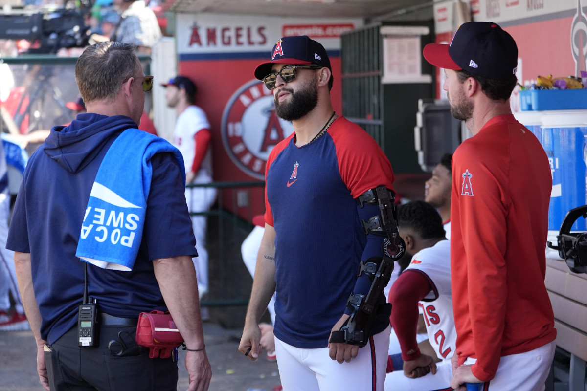 Los Angeles Angels starting pitcher Patrick Sandoval (center) in the dugout during the game against the Oakland Athletics at Angel Stadium.