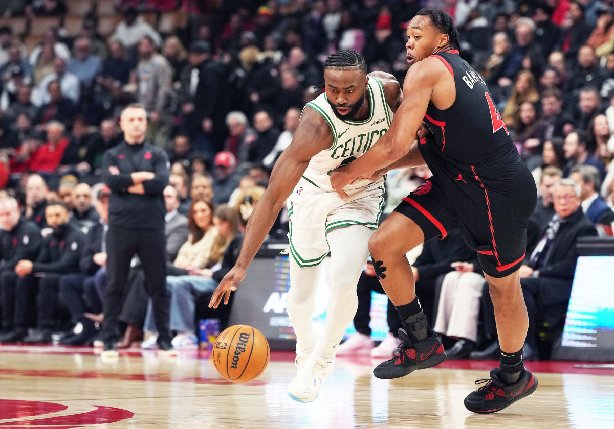 Jaylen Brown drives vs. Scottie Barnes of the Toronto Raptors.