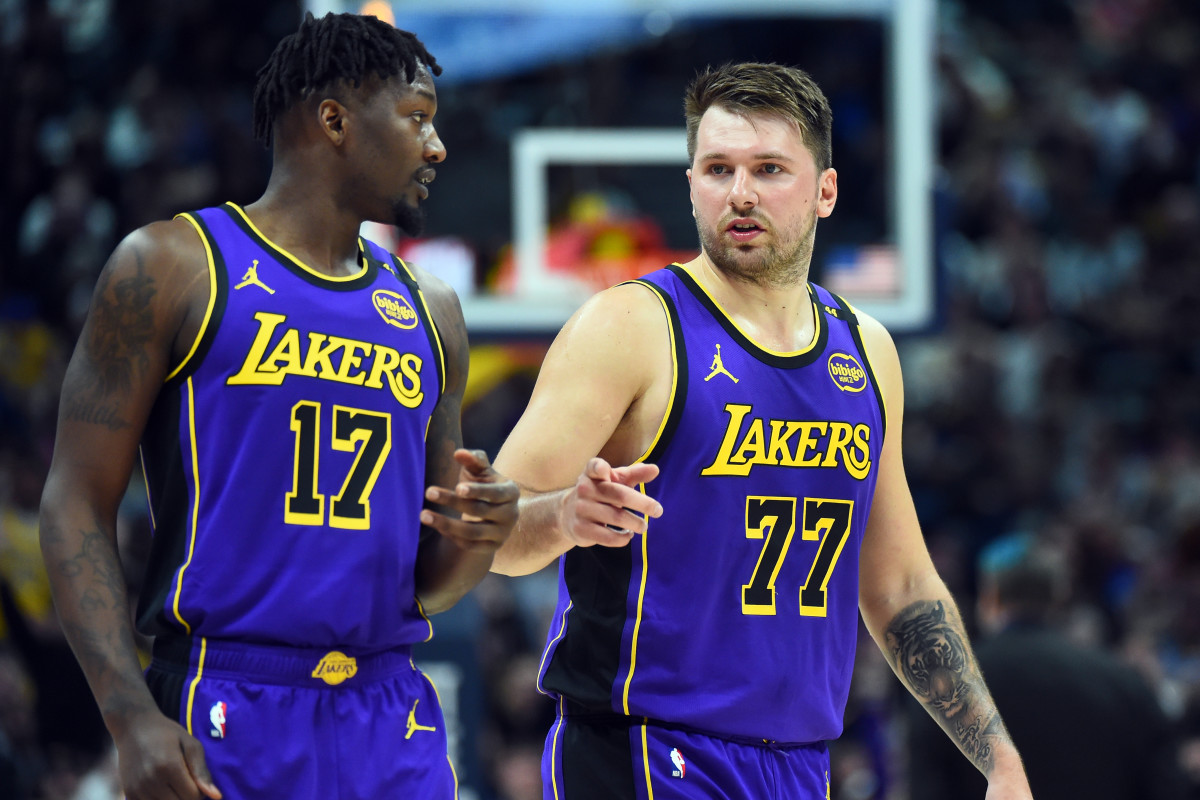 Los Angeles Lakers guard Luka Doncic talks with forward Dorian Finney-Smith