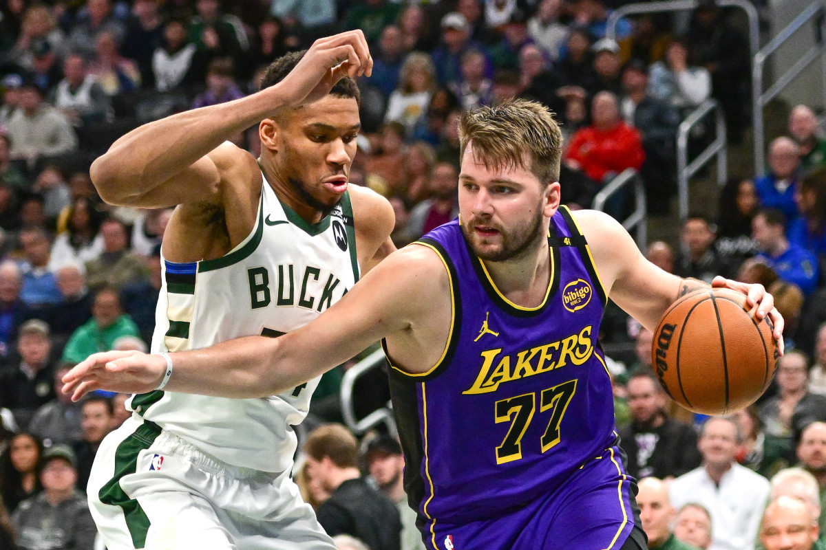 Milwaukee Bucks forward Giannis Antetokounmpo guards Los Angeles Lakers forward Luka Doncic
