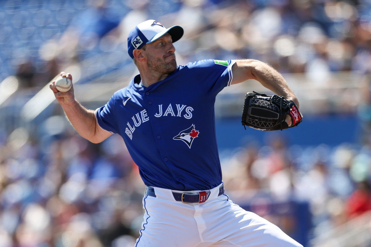 Toronto Blue Jays pitcher throwing a pitch in Game 1