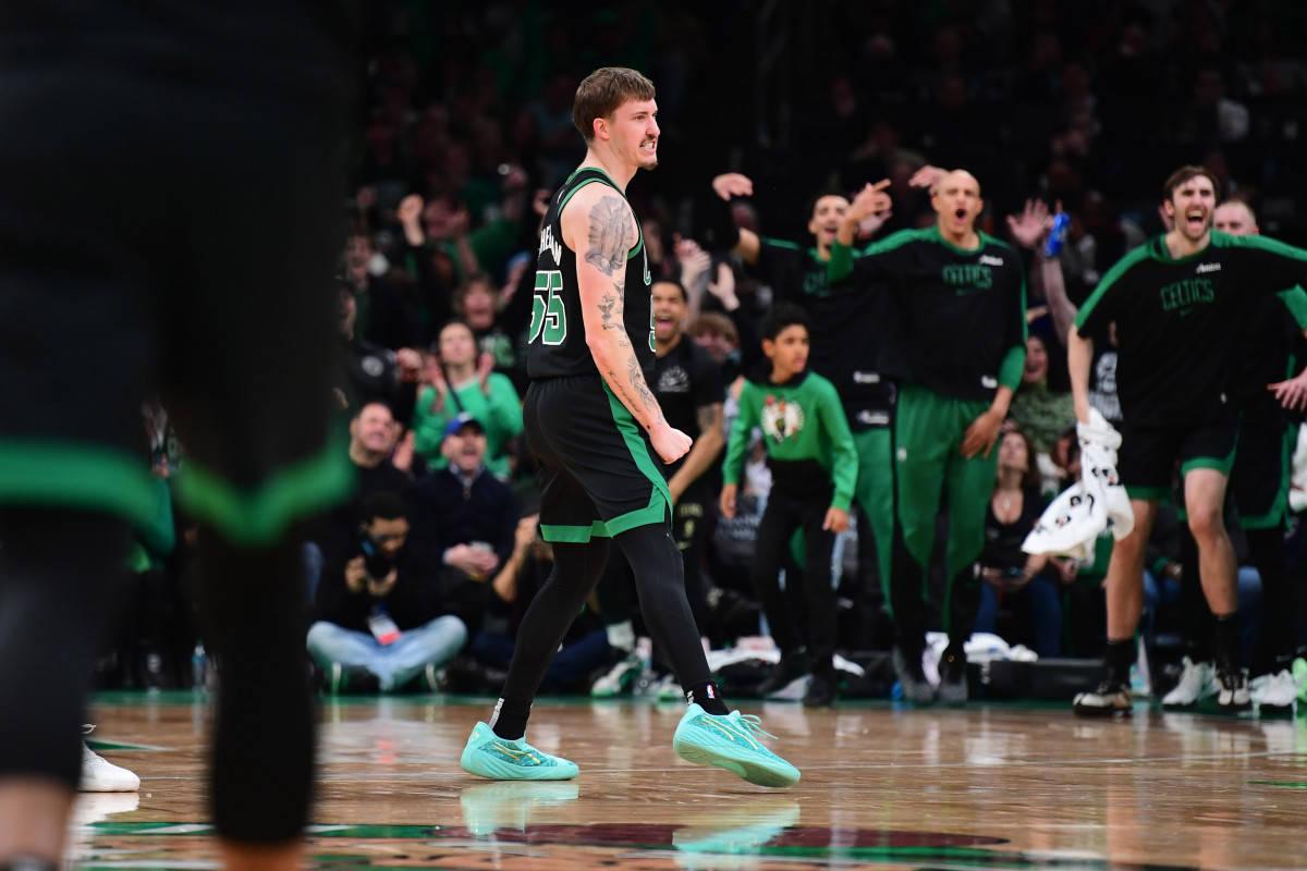 Mar 18, 2025; Boston, Massachusetts, USA; Boston Celtics forward Baylor Scheierman (55) reacts after making a three point shot during the second half against the Brooklyn Nets at TD Garden. Mandatory Credit: Bob DeChiara-Imagn Images  