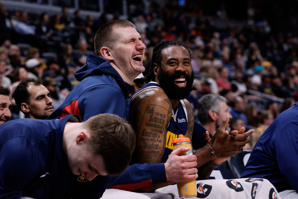 Denver Nuggets center Nikola Jokic (15) and center DeAndre Jordan (6)