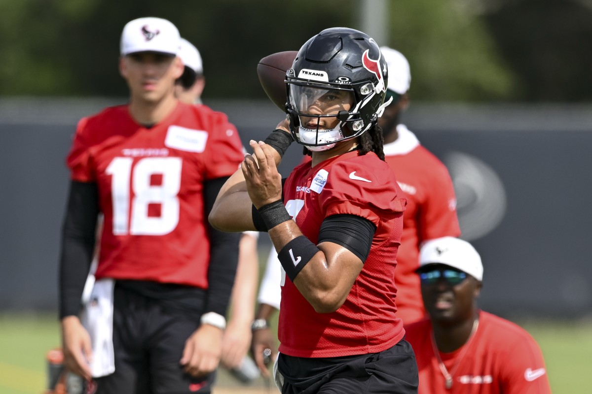 Houston Texans quarterback C.J. Stroud (7) participates in a drill