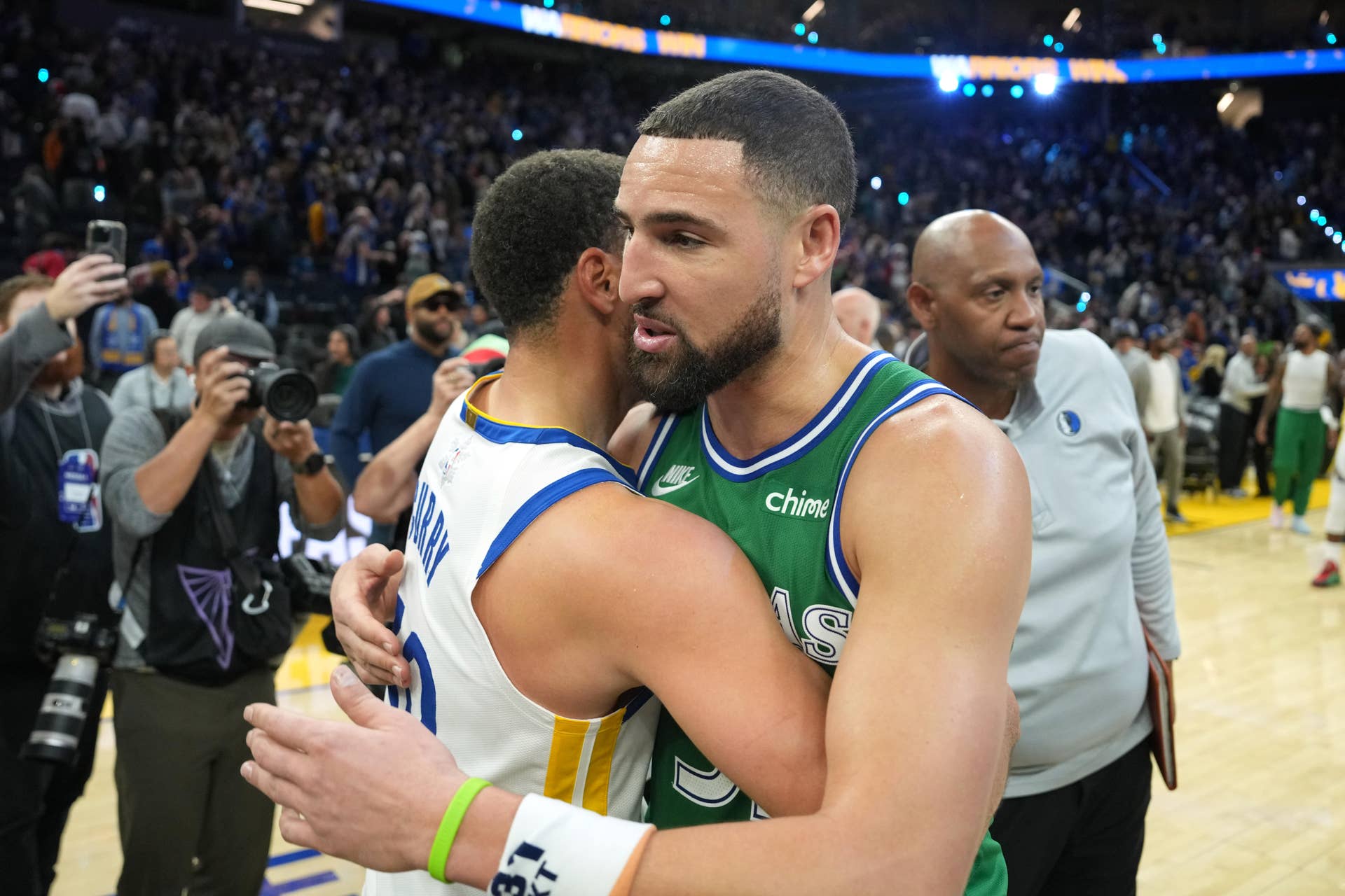 Golden State Warriors guard Stephen Curry (30) and Dallas Mavericks guard Klay Thompson (31).