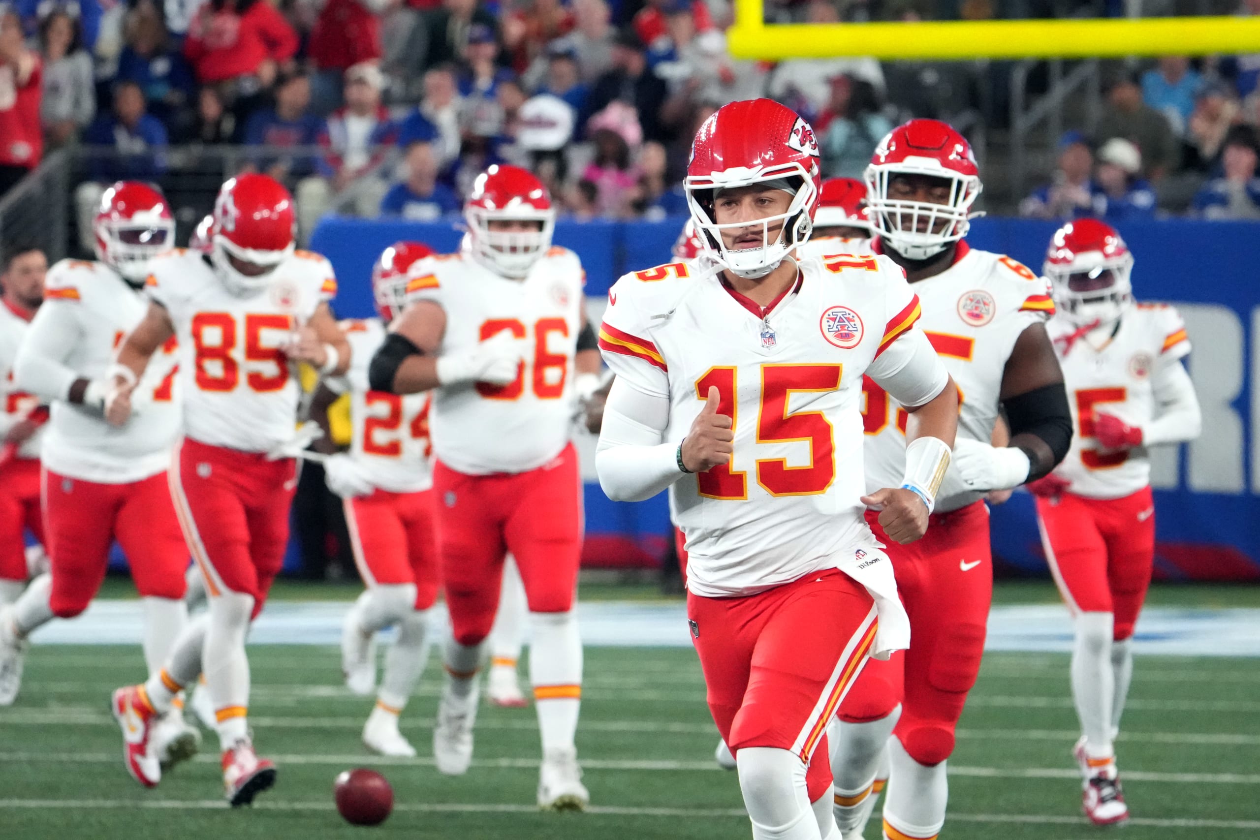 Patrick Mahomes leads the Chiefs onto the field against the Giants