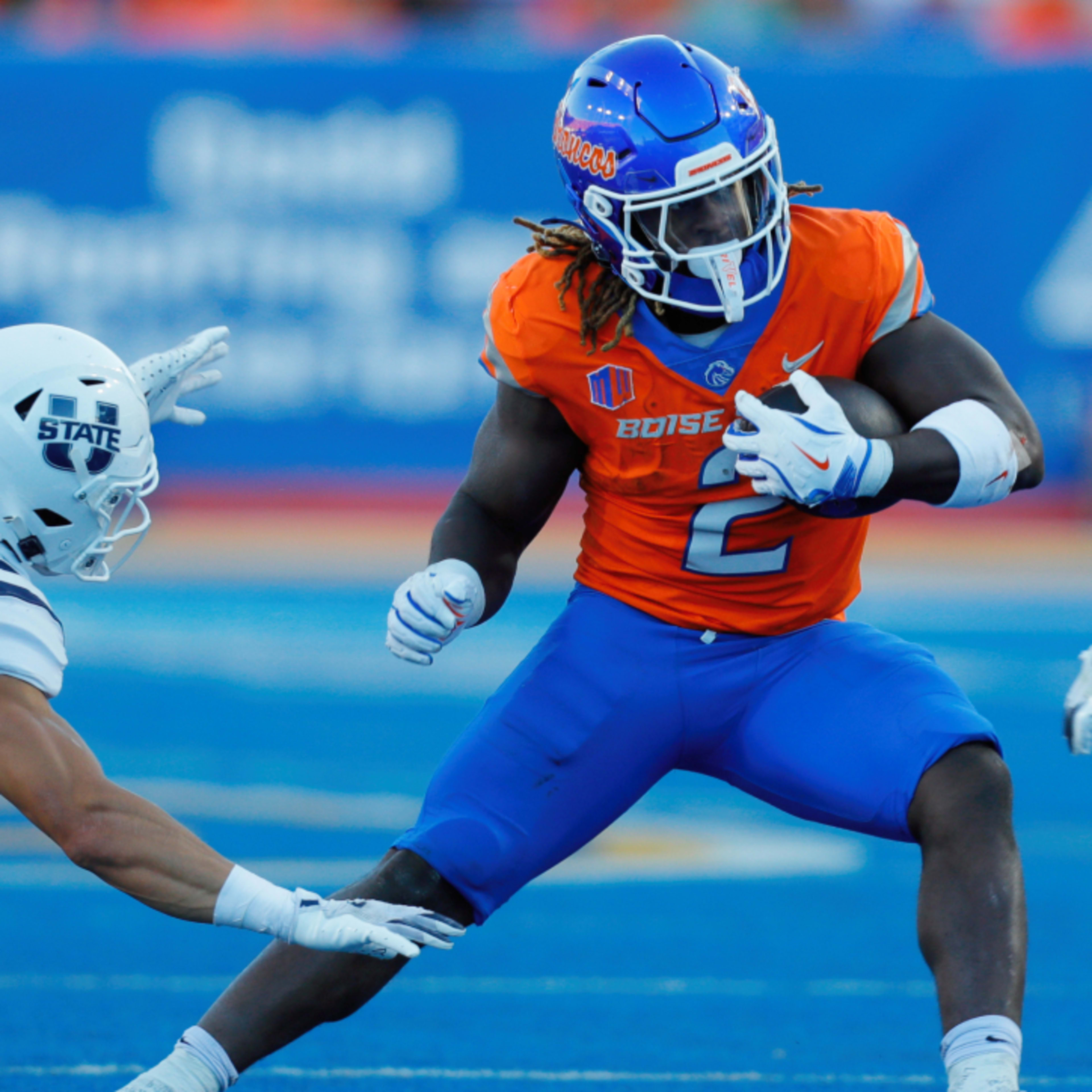 Oct 5, 2024; Boise, Idaho, USA; Boise State Broncos running back Ashton Jeanty (2) runs for gain during the first half against the Utah State Aggies at Albertsons Stadium.