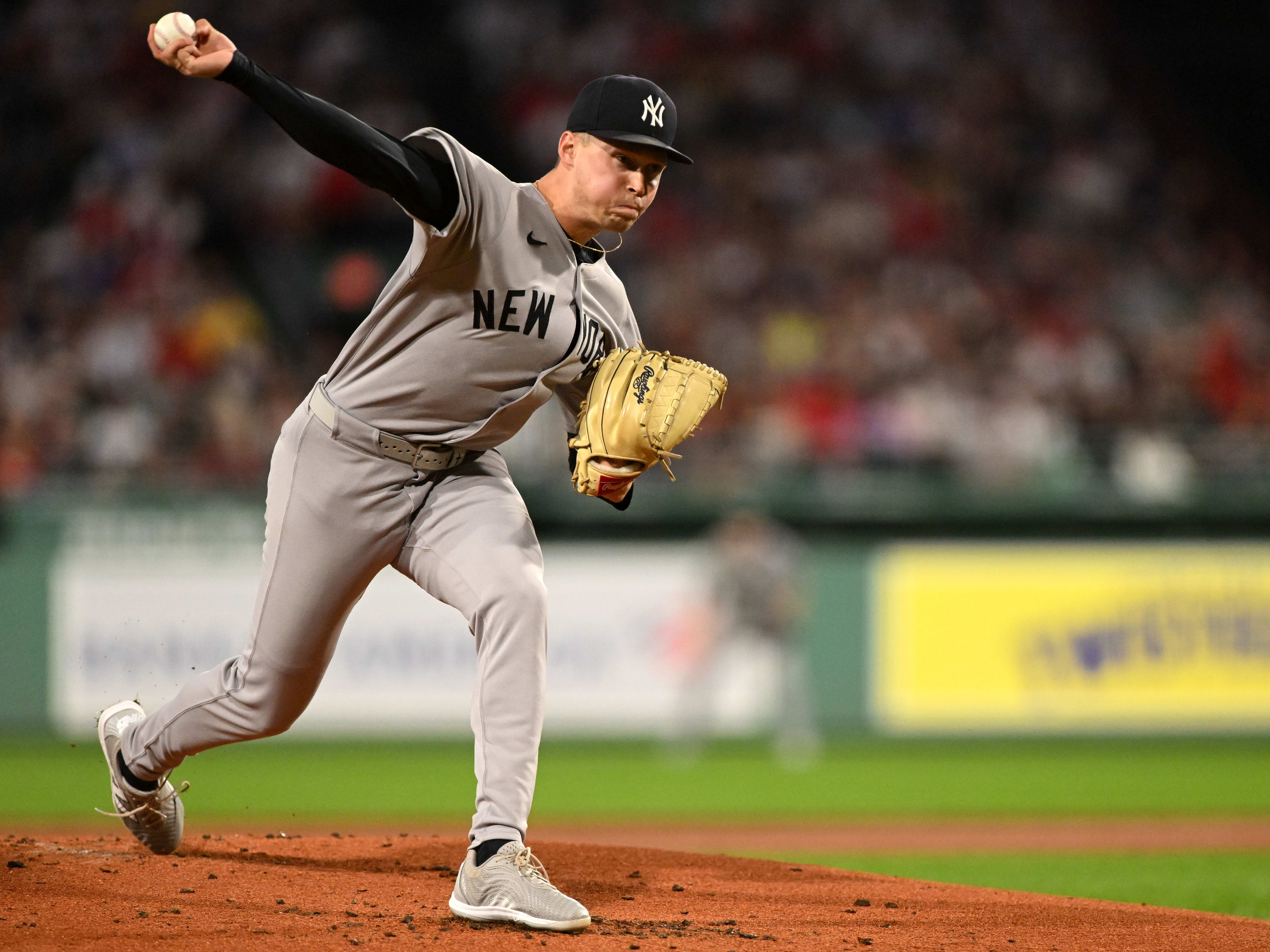 New York Yankees starting pitcher Will Warren pitches against the Boston Red Sox during the first inning at Fenway Park. 