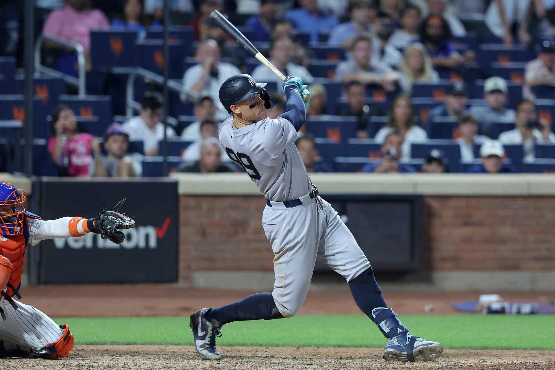 New York Yankees center fielder Aaron Judge follows through on a grand slam home run during the eighth inning against the New York Mets at Citi Field.